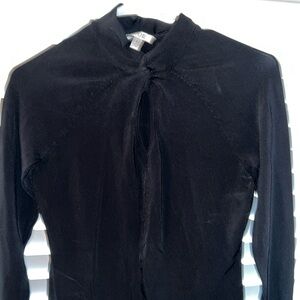 Cache Black spandex sweater in good condition.